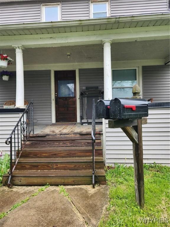 158 Keil St, North Tonawanda, NY 14120 - view of exterior entry featuring a porch