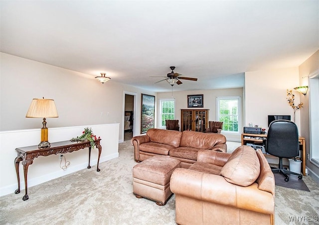 4786 Ormonde Dr, Cazenovia, NY 13035 - carpeted living room with ceiling fan, an office area, and baseboards