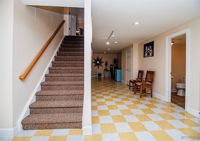 4786 Ormonde Dr, Cazenovia, NY 13035 - stairs featuring tile patterned floors, baseboards, and recessed lighting