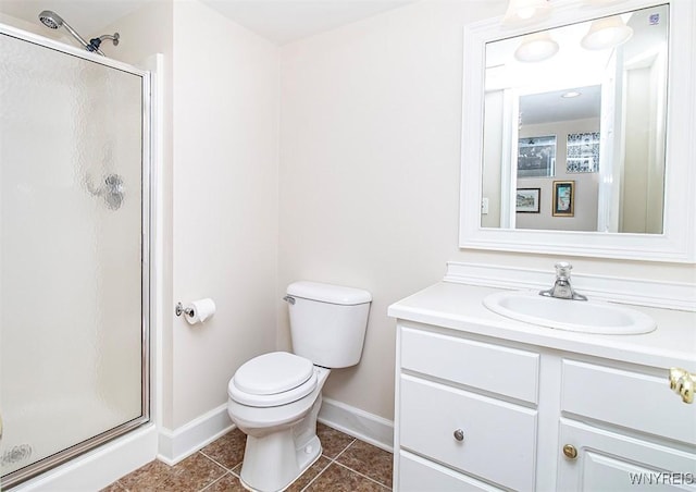 4786 Ormonde Dr, Cazenovia, NY 13035 - bathroom featuring vanity, baseboards, a stall shower, tile patterned flooring, and toilet