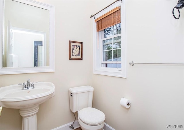 4786 Ormonde Dr, Cazenovia, NY 13035 - bathroom with baseboards and toilet