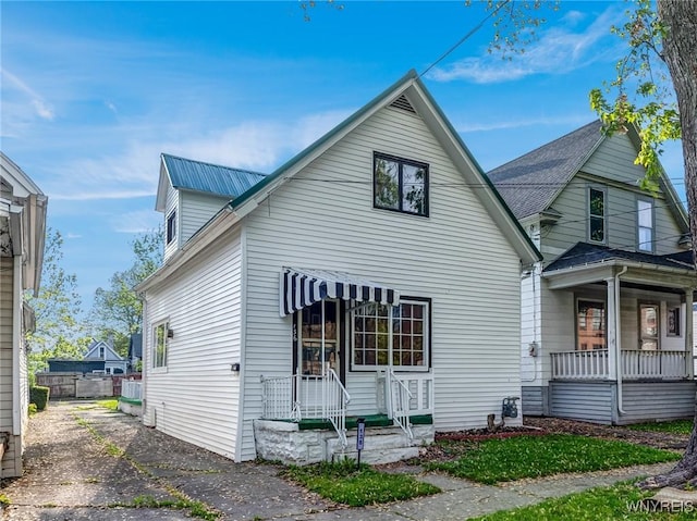 136 Benzinger St, Buffalo, NY 14206 - view of property exterior featuring a porch and asphalt driveway