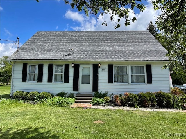 6429 Ellicott Street Rd, Pavilion, NY 14525 - cape cod home with a front yard, a shingled roof, and entry steps