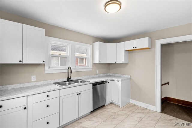 19 Mayville Ave, Tonawanda-Town, NY 14217 - kitchen with dishwasher, a sink, white cabinets, light marble finish flooring, and light countertops