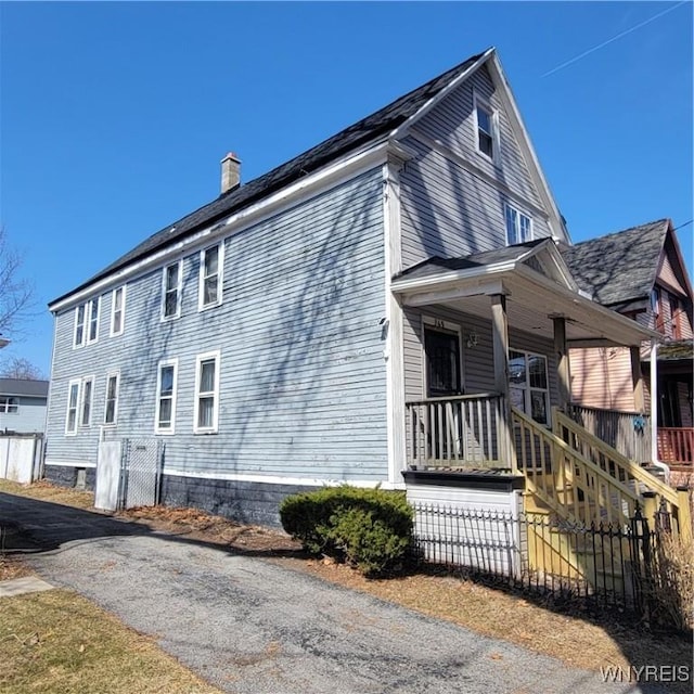360 Watson St, Buffalo, NY 14212 - view of property exterior featuring a chimney and a porch