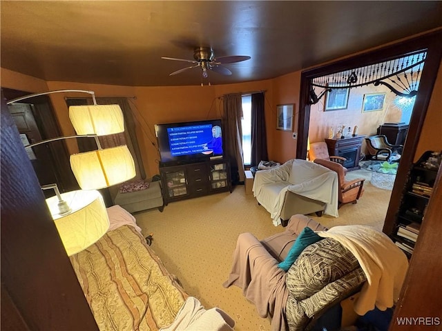 360 Watson St, Buffalo, NY 14212 - living room featuring a wood stove, carpet floors, and a ceiling fan