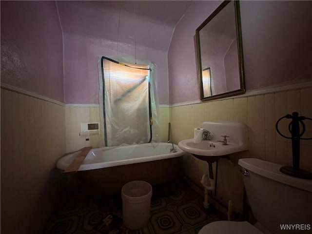 360 Watson St, Buffalo, NY 14212 - bathroom with a freestanding bath and a wainscoted wall