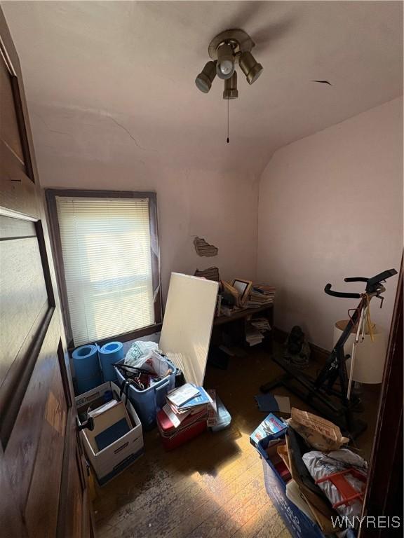 360 Watson St, Buffalo, NY 14212 - bedroom featuring wood finished floors, vaulted ceiling, and ceiling fan
