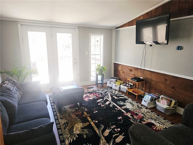 2968 County Highway 11, Hartwick, NY 13348 - living room with wood walls, lofted ceiling, and wood finished floors