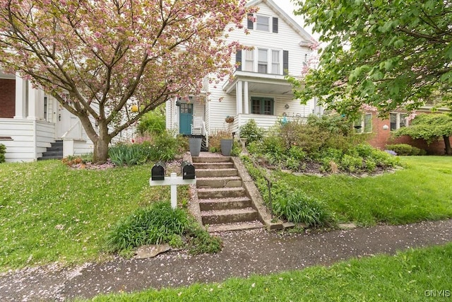 173 Mosley Dr Unit 1, Syracuse, NY 13206 - traditional style home with stairs and a front yard