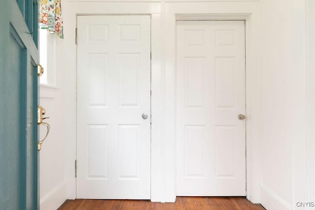 173 Mosley Dr Unit 1, Syracuse, NY 13206 - unfurnished bedroom with dark wood-style floors