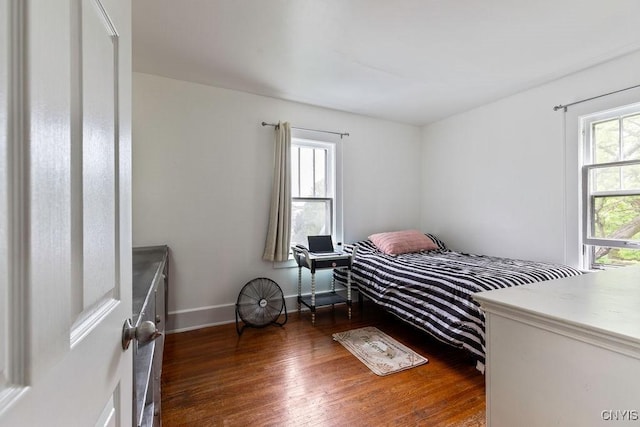 173 Mosley Dr Unit 1, Syracuse, NY 13206 - bedroom with wood finished floors and baseboards