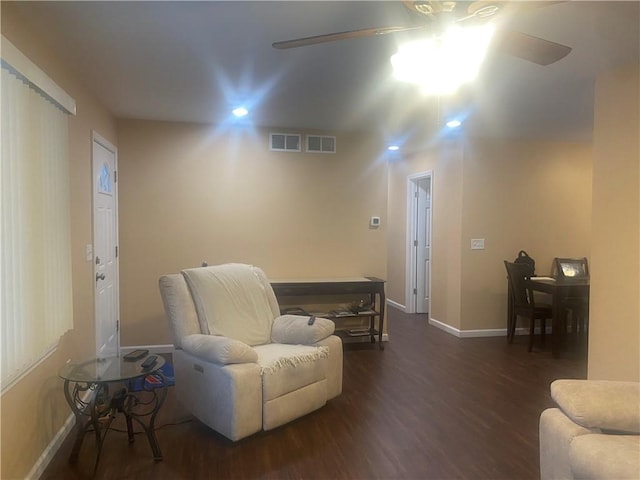 6 Gemini Cir, Gates, NY 14606 - sitting room with wood finished floors, a ceiling fan, and baseboards