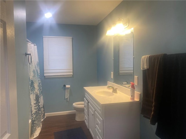 6 Gemini Cir, Gates, NY 14606 - bathroom with toilet, vanity, wood finished floors, baseboards, and a shower with curtain
