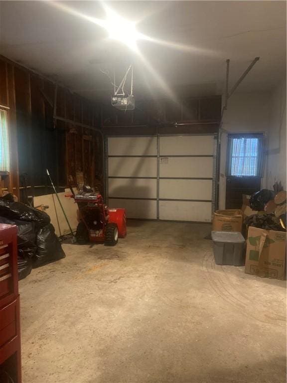 6 Gemini Cir, Gates, NY 14606 - garage featuring a garage door opener