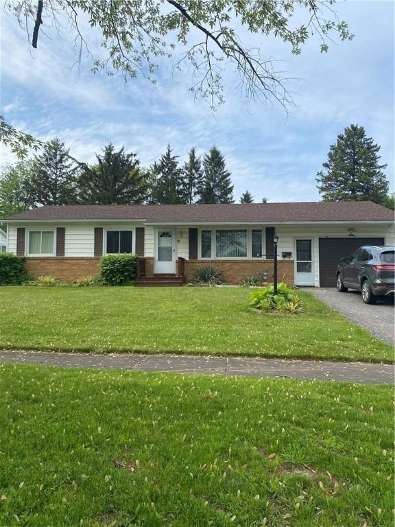 6 Gemini Cir, Gates, NY 14606 - ranch-style home with a garage, brick siding, and a front yard