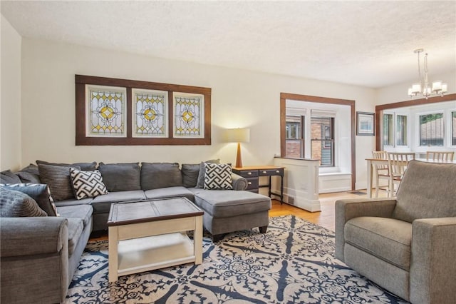 865 Harvard St, Rochester, NY 14610 - living room with a chandelier and wood finished floors