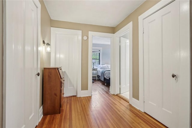 865 Harvard St, Rochester, NY 14610 - corridor featuring light wood-style flooring and baseboards