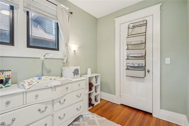 865 Harvard St, Rochester, NY 14610 - bedroom with baseboards and light wood-style flooring