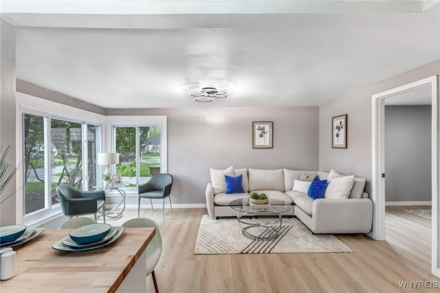 296 Burke Dr, Cheektowaga, NY 14215 - living room featuring wood finished floors and baseboards