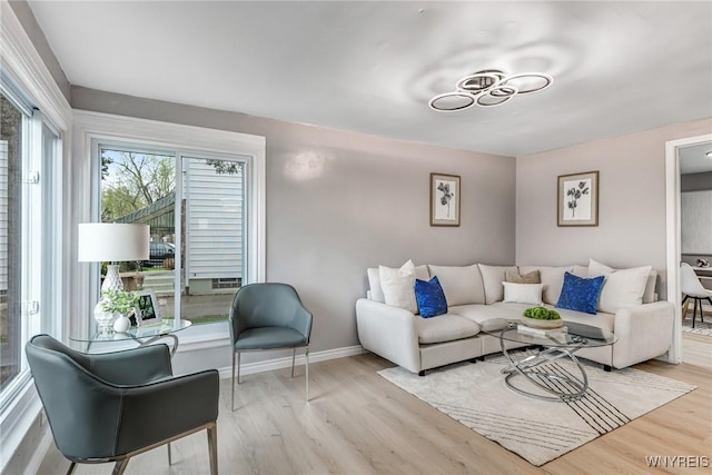296 Burke Dr, Cheektowaga, NY 14215 - living room featuring wood finished floors and baseboards