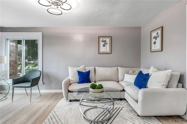 296 Burke Dr, Cheektowaga, NY 14215 - living room with light wood finished floors and baseboards