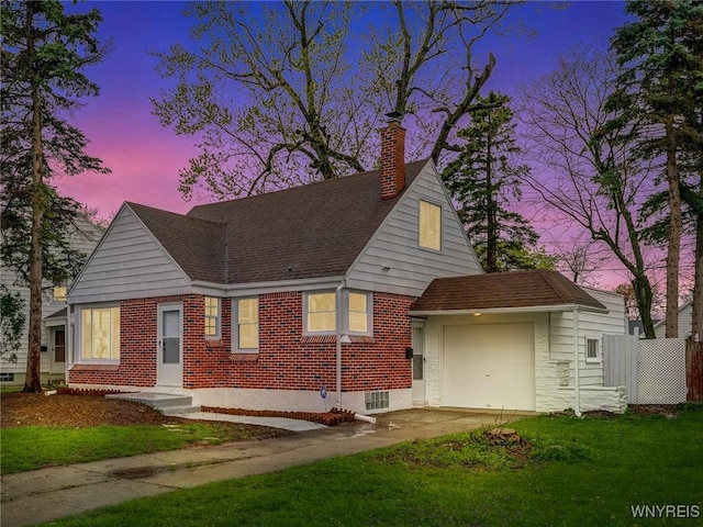 296 Burke Dr, Cheektowaga, NY 14215 - view of front facade with an attached garage, a chimney, driveway, brick siding, and roof with shingles
