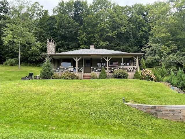 120 Fisher Ln, Afton, NY 13730 - view of front of house featuring a chimney, a front yard, and covered porch