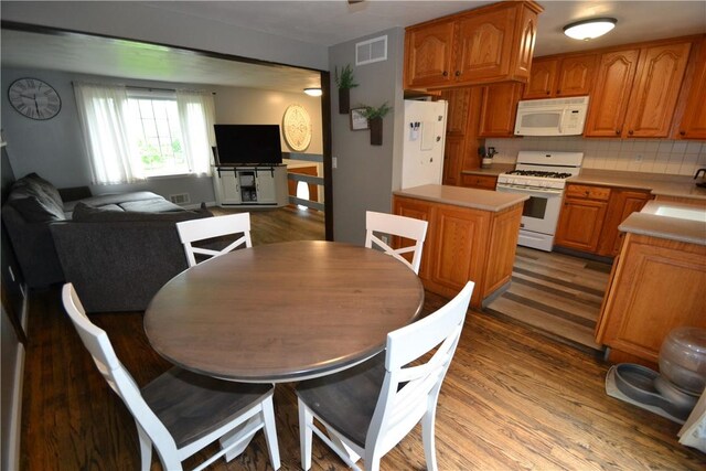 2314 Vandy Dr, Macedon, NY 14522 - dining room with wood finished floors