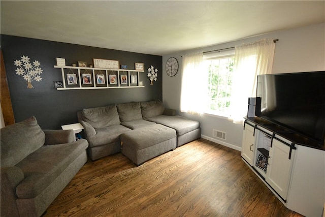 2314 Vandy Dr, Macedon, NY 14522 - living area with dark wood finished floors and baseboards