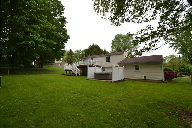 2314 Vandy Dr, Macedon, NY 14522 - view of yard with a hot tub, stairs, and a deck