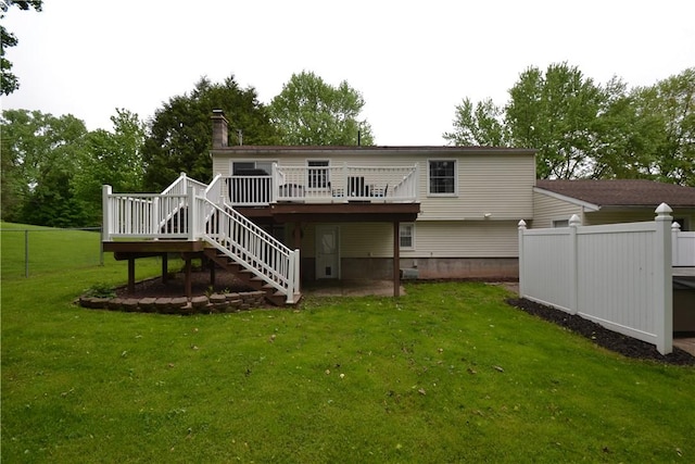 2314 Vandy Dr, Macedon, NY 14522 - back of house featuring a wooden deck, stairway, and a chimney
