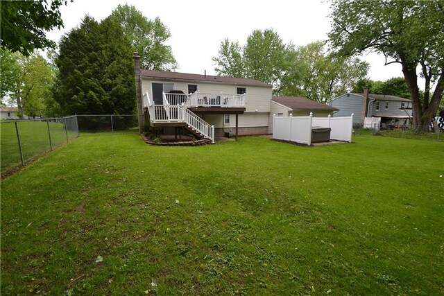 2314 Vandy Dr, Macedon, NY 14522 - back of property with stairway, a deck, and a chimney