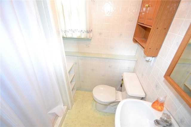 2314 Vandy Dr, Macedon, NY 14522 - full bathroom with tile walls, a sink, toilet, and a shower with shower curtain
