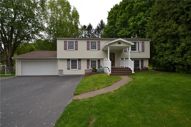 2314 Vandy Dr, Macedon, NY 14522 - split foyer home featuring an attached garage, driveway, and a front yard