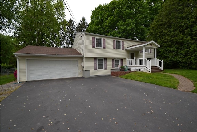 2314 Vandy Dr, Macedon, NY 14522 - view of front of house with an attached garage, driveway, and a front lawn