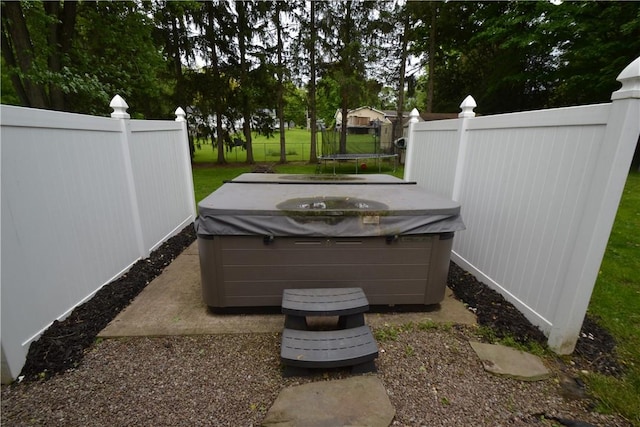 2314 Vandy Dr, Macedon, NY 14522 - view of patio / terrace featuring a hot tub