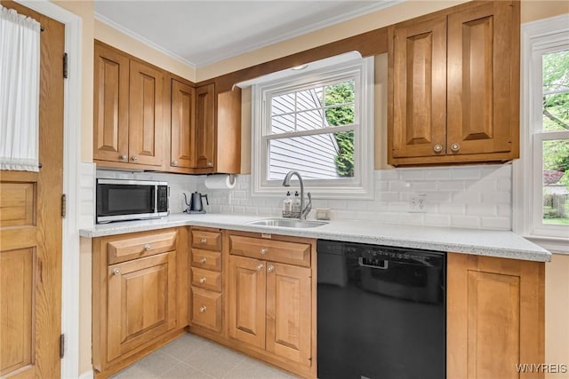 370 Mount Vernon Rd, Amherst, NY 14226 - kitchen with black dishwasher, a sink, stainless steel microwave, tasteful backsplash, and brown cabinetry