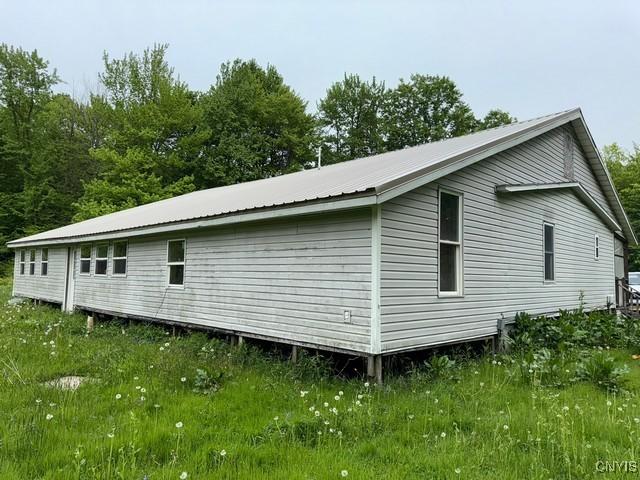 576 County Route 85, Granby, NY 13069 - view of property exterior with metal roof