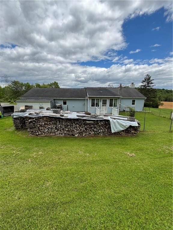 115 Depew Rd, Tioga, NY 13734 - back of house with a yard and an attached garage