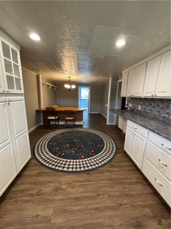 115 Depew Rd, Tioga, NY 13734 - kitchen featuring white cabinetry, dark countertops, dark wood finished floors, recessed lighting, and decorative backsplash
