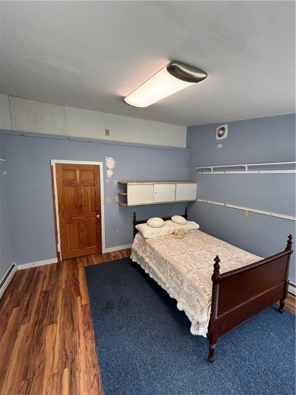 115 Depew Rd, Tioga, NY 13734 - bedroom featuring wood finished floors and baseboards