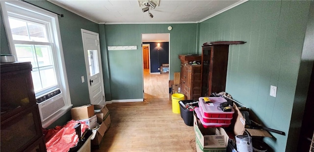 12034 Washington St, Wolcott, NY 14590 - interior space featuring crown molding, light wood-type flooring, and baseboards