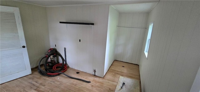12034 Washington St, Wolcott, NY 14590 - unfurnished bedroom featuring wood finished floors and crown molding