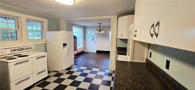 12034 Washington St, Wolcott, NY 14590 - kitchen with white appliances, a chandelier, dark floors, white cabinetry, and ornamental molding