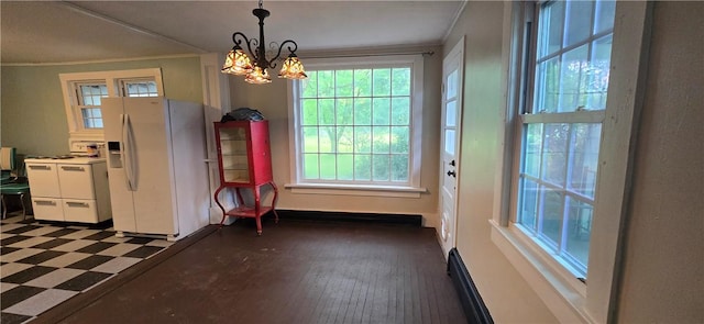 12034 Washington St, Wolcott, NY 14590 - dining room with crown molding, a chandelier, baseboards, and baseboard heating