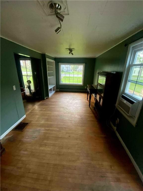 12034 Washington St, Wolcott, NY 14590 - living room with wood finished floors and healthy amount of natural light