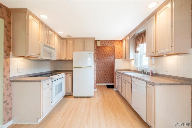 80 Hilton Blvd, Amherst, NY 14226 - kitchen featuring white appliances, a sink, wallpapered walls, baseboards, and light wood-style flooring
