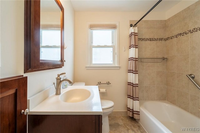 80 Hilton Blvd, Amherst, NY 14226 - bathroom with toilet, vanity, plenty of natural light, and shower / bath combo