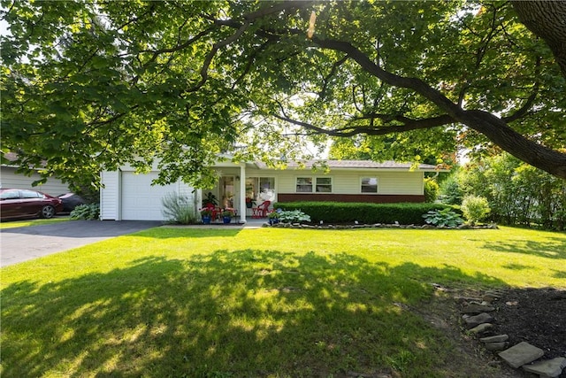 2804 Westinghouse Rd, Horseheads, NY 14845 - view of front of house with driveway, a garage, a front lawn, and covered porch